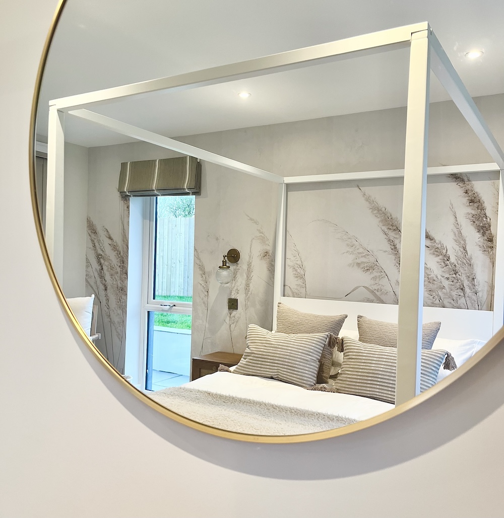 Interior Design, Cornwall. Photo of bedroom reflected in mirror